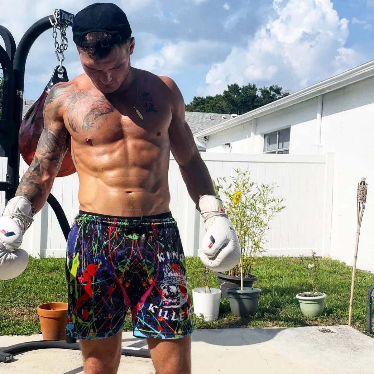 Neon Paint Splatter Mesh Shorts